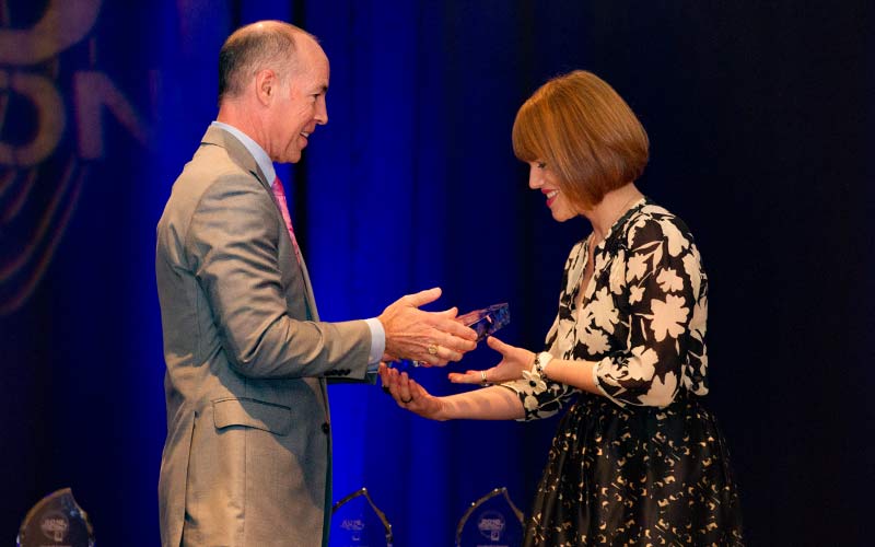 Elisabeth  Donaldson Receiving Her Award From Matthew Bourlakas