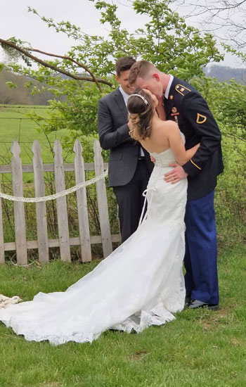 Gabi and Jacob Settles kiss during their April 7, 2018, wedding.